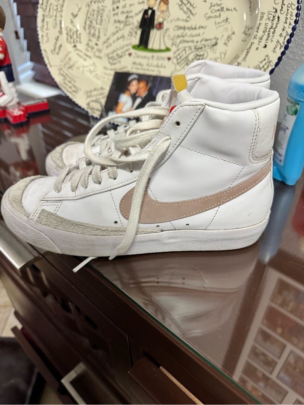 Nike Women’s High-Top Leather Sneakers in White with Pink Swoosh